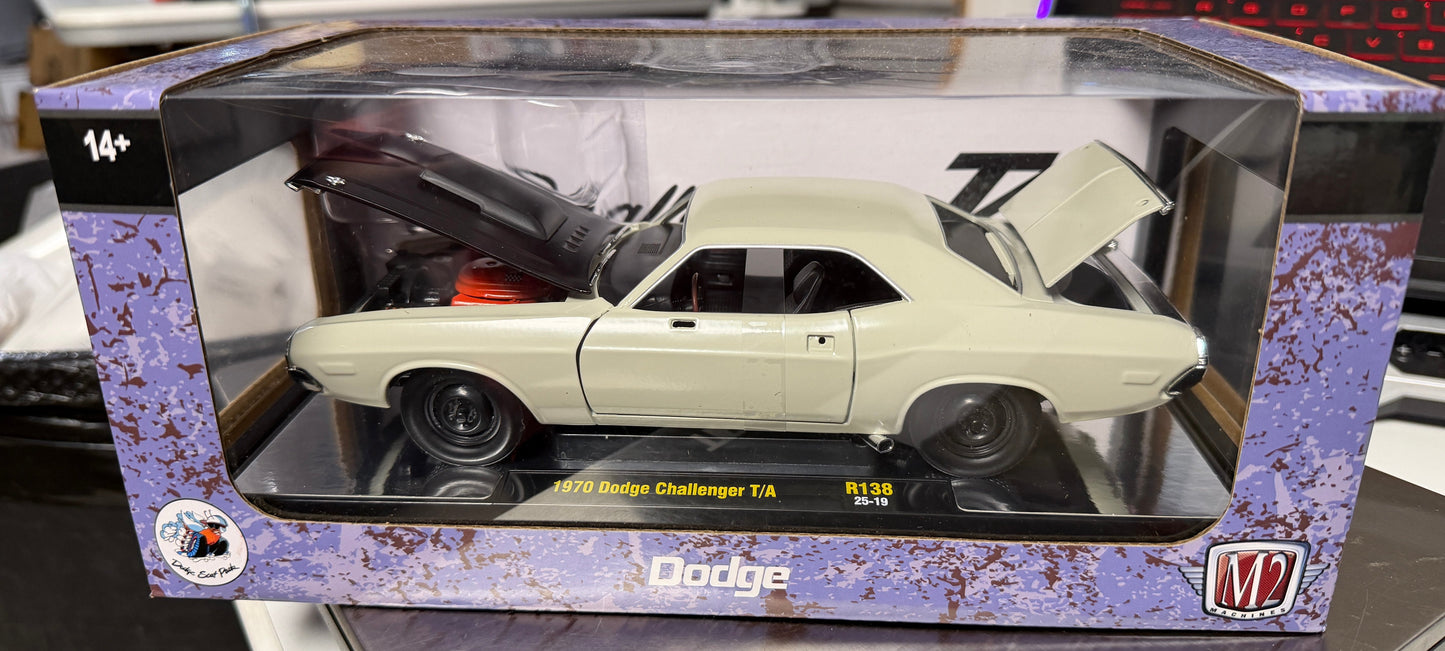 Model car in a display box with 'Dodge' branding
